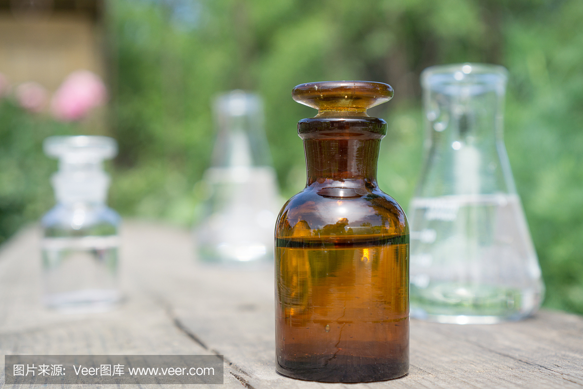 液體在化學(xué)器皿的背景植物,肥料